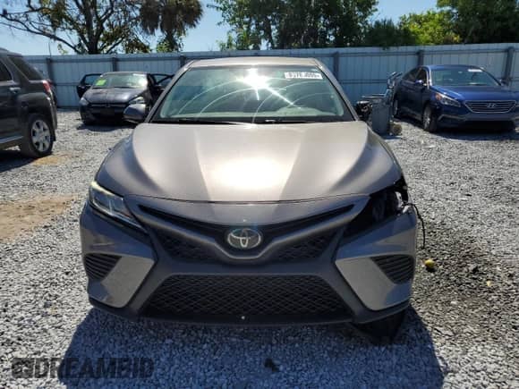 2019 Toyota Camry SE z VIN 4T1B11HK0KU854124, wystawiony jako Copart lot #85765085 z przebiegiem 103 133 mil mil oraz Szkoda całkowita • Salvage title. Historia ofert i sprzedaży dostępna na DreamBid. Obrazek 5.