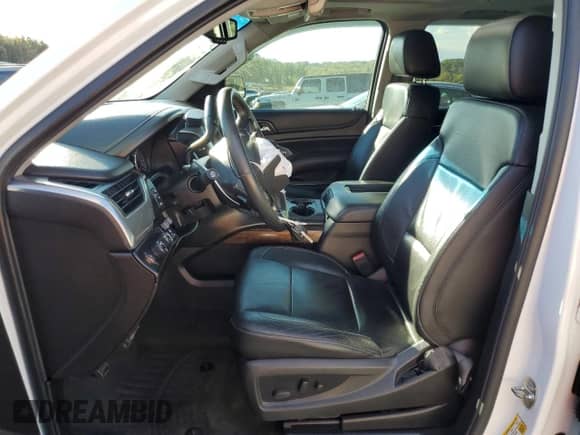 2015 Chevrolet Tahoe LT with VIN 1GNSKBKC9FR274007, listed as a Copart auction lot 85695475 with 154,474 mi miles and Salvage title. Bid and sale history available at DreamBid. Image 7.
