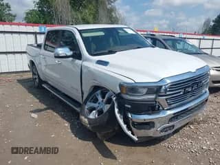 2021 Ram 1500 Laramie z VIN 1C6RREJT6MN628714, wystawiony jako IAAI lot #42075167 z przebiegiem 64 974 mil mil oraz . Historia ofert i sprzedaży dostępna na DreamBid. Obrazek 1.
