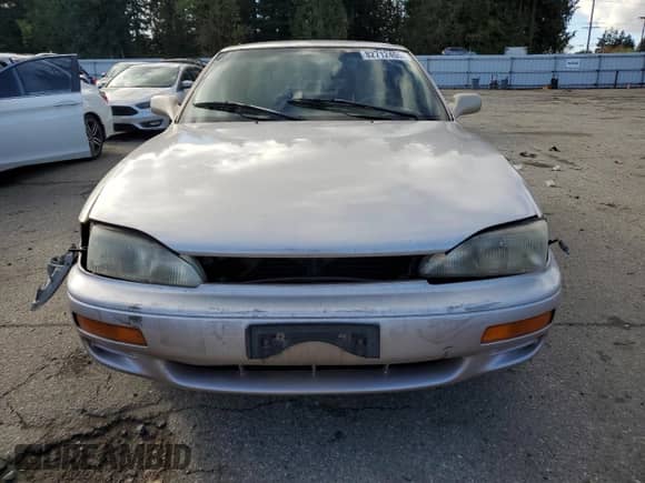 1995 Toyota Camry LE z VIN 4T1SK12E6SU898113, wystawiony jako Copart lot #82712455 z przebiegiem 170 935 mil mil oraz Szkoda całkowita • Salvage title. Historia ofert i sprzedaży dostępna na DreamBid. Obrazek 5.
