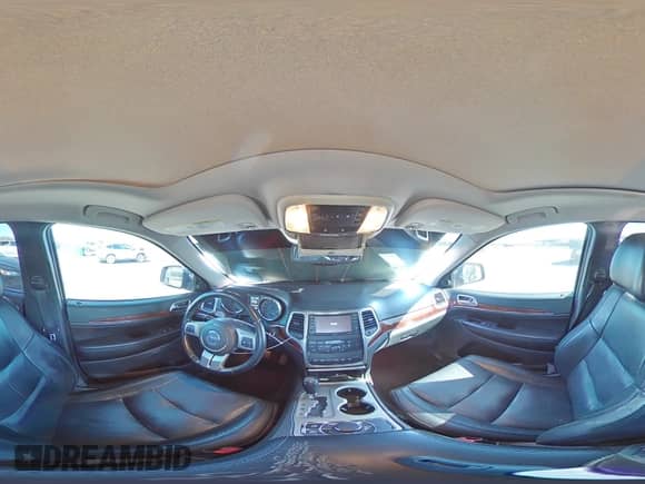 2012 Jeep Grand Cherokee Limited z VIN 1C4RJFBT5CC210966, wystawiony jako Copart lot #71712565 z przebiegiem 139 539 mil mil oraz Szkoda całkowita • Salvage title. Historia ofert i sprzedaży dostępna na DreamBid. Obrazek 16.