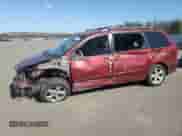 2006 Toyota Sienna XLE z VIN 5TDZA22C76S409318, wystawiony jako Copart lot #85260825 z przebiegiem 183 779 mil mil oraz Szkoda całkowita • Salvage title. Historia ofert i sprzedaży dostępna na DreamBid. Obrazek 1.