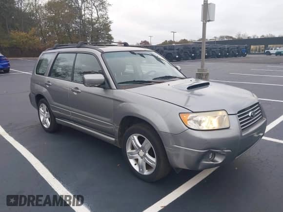 2007 Subaru Forester Special Sports XT z VIN JF1SG69637H740500, wystawiony jako IAAI lot #43586696 z przebiegiem 106 874 mil mil oraz . Historia ofert i sprzedaży dostępna na DreamBid. Obrazek 1.