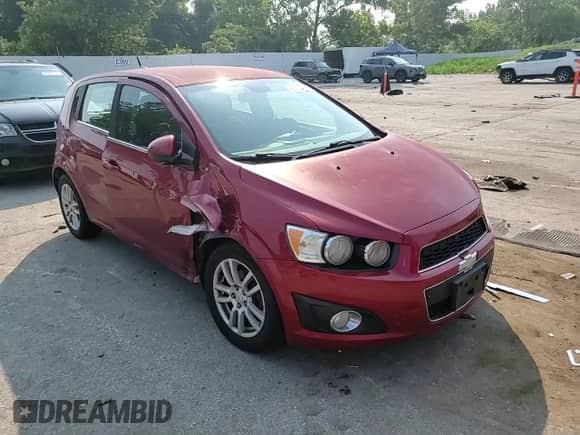 2012 Chevrolet Sonic LT z VIN 1G1JD6SH6C4175051, wystawiony jako Copart lot #67231065 z przebiegiem 197 299 mil mil oraz Szkoda całkowita • Salvage title. Historia ofert i sprzedaży dostępna na DreamBid. Obrazek 13.
