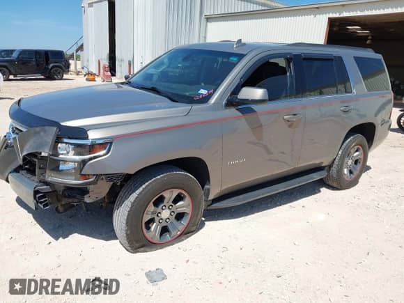 2019 Chevrolet Tahoe LS with VIN 1GNSCAKC9KR382001, listed as a IAAI auction lot 42811379 with 73,688 mi miles and . Bid and sale history available at DreamBid. Image 21.