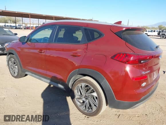 2019 Hyundai Tucson SEL with VIN KM8J33AL9KU981359, listed as a IAAI auction lot 41051797 with 99,147 mi miles and . Bid and sale history available at DreamBid. Image 3.
