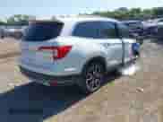 2021 Honda Pilot Touring 7-Passenger z VIN 5FNYF5H62MB011807, wystawiony jako IAAI lot #43367010 z przebiegiem Nie podano mil oraz . Historia ofert i sprzedaży dostępna na DreamBid. Obrazek 4.