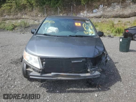 2013 Honda Odyssey EX-L with VIN 5FNRL5H65DB029618, listed as a Copart auction lot 70712485 with 195,097 mi miles and Salvage title. Bid and sale history available at DreamBid. Image 5.
