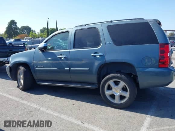 2008 Chevrolet Tahoe LTZ with VIN 1GNFC13JX8J216303, listed as a IAAI auction lot 42287728 with 152,012 mi miles and . Bid and sale history available at DreamBid. Image 14.