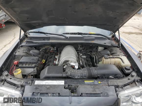 2006 Chrysler 300 C SRT-8 z VIN 2C3LA73W76H102777, wystawiony jako Copart lot #60065925 z przebiegiem 97 765 mil mil oraz Szkoda całkowita • Salvage title. Historia ofert i sprzedaży dostępna na DreamBid. Obrazek 11.