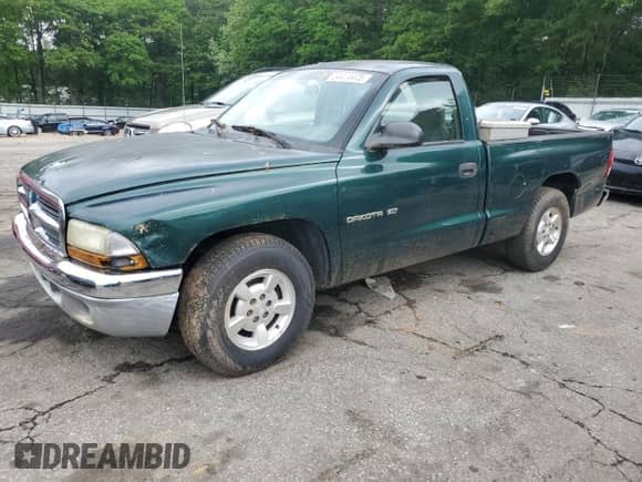 2001 Dodge Dakota with VIN 1B7FL26X61S248969, listed as a Copart auction lot 54474475 with 232,889 mi miles and Non repairable. Bid and sale history available at DreamBid. Image 1.