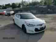 2013 Hyundai Veloster w/Gray Int z VIN KMHTC6AD4DU108401, wystawiony jako Copart lot #84835955 z przebiegiem 125 851 mil mil oraz Szkoda całkowita • Salvage title. Historia ofert i sprzedaży dostępna na DreamBid. Obrazek 14.