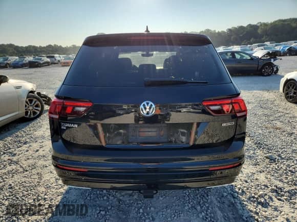 2021 Volkswagen Tiguan SE с VIN 3VV2B7AX5MM111879, выставлен на аукционе Copart как лот 69407615 с пробегом 63 151 миль миль и Списание • Salvage title. История ставок и продаж доступна на DreamBid. Изображение 6.