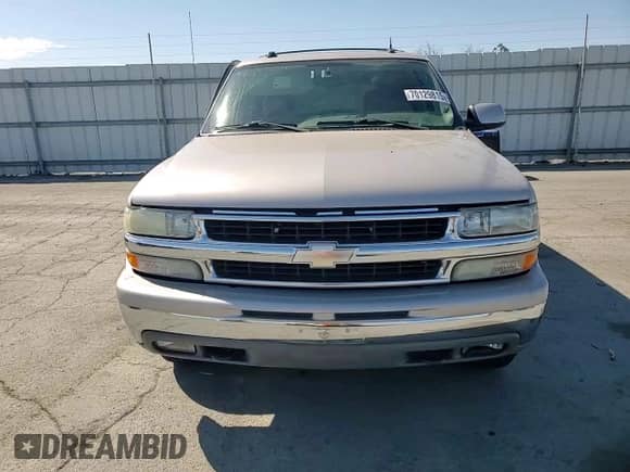 2004 Chevrolet Tahoe LT z VIN 1GNEK13TX4J198363, wystawiony jako Copart lot #70129815 z przebiegiem 224 521 mil mil oraz Szkoda całkowita • Salvage title. Historia ofert i sprzedaży dostępna na DreamBid. Obrazek 14.