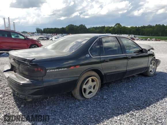 1996 Chevrolet Caprice 1SA Special Value с VIN 1G1BL52PXTR187425, выставлен на аукционе Copart как лот 61310825 с пробегом Не указан миль и Списание • Salvage title. История ставок и продаж доступна на DreamBid. Изображение 3.