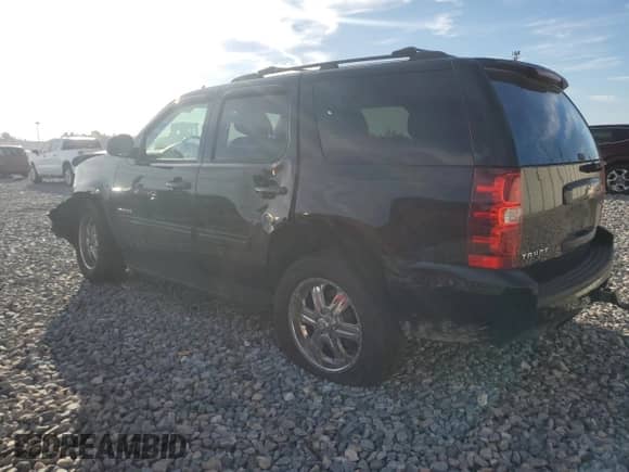 2011 Chevrolet Tahoe LS с VIN 1GNSCAE0XBR223506, выставлен на аукционе Copart как лот 87433045 с пробегом 156 433 миль миль и Списание • Salvage title. История ставок и продаж доступна на DreamBid. Изображение 2.