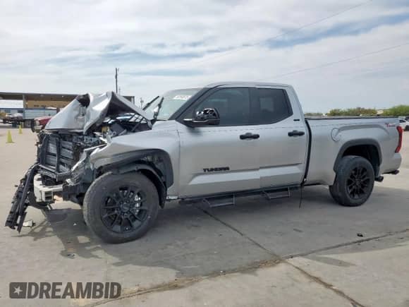 2023 Toyota Tundra SR5 with VIN 5TFLA5DAXPX063117, listed as a Copart auction lot 50590875 with 60,409 mi miles and Salvage title. Bid and sale history available at DreamBid. Image 1.
