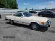1984 Mercedes-Benz 380 SL with VIN WDBBA45A2EA011340, listed as a Copart auction lot 56949325 with 113,951 mi miles and Salvage title. Bid and sale history available at DreamBid. Image 4.