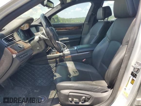 2013 BMW 7 Series 750i с VIN WBAYA8C58DC996865, выставлен на аукционе Copart как лот 61831294 с пробегом 151 238 миль миль и Списание • Salvage title. История ставок и продаж доступна на DreamBid. Изображение 7.