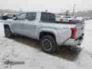 2024 Toyota Tacoma SR5 with VIN 3TMLB5JN6RM018639, listed as a IAAI auction lot 41251861 with 10,088 mi miles and . Bid and sale history available at DreamBid. Image 3.