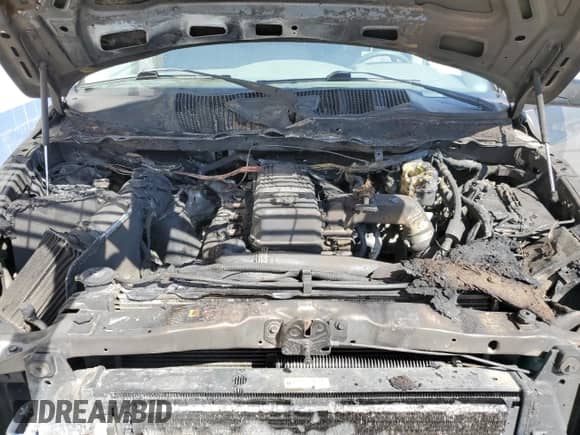 2006 Dodge 2500 Laramie z VIN 3D7KS29C26G194035, wystawiony jako Copart lot #68838995 z przebiegiem 229 006 mil mil oraz Szkoda całkowita • Salvage title. Historia ofert i sprzedaży dostępna na DreamBid. Obrazek 11.