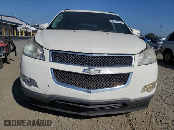 2012 Chevrolet Traverse 1LT z VIN 1GNKRGED0CJ138419, wystawiony jako Copart lot #90119345 z przebiegiem 128 476 mil mil oraz Czysty tytuł • Clean title. Historia ofert i sprzedaży dostępna na DreamBid. Obrazek 5.