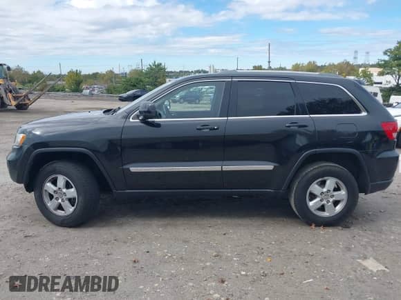 2012 Jeep Grand Cherokee Laredo с VIN 1C4RJFAG8CC128749, выставлен на аукционе IAAI как лот 43398114 с пробегом 111 505 миль миль и . История ставок и продаж доступна на DreamBid. Изображение 14.