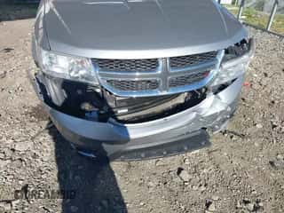 2017 Dodge Journey SXT z VIN 3C4PDCBG3HT602789, wystawiony jako IAAI lot #43486576 z przebiegiem 198 339 mil mil oraz . Historia ofert i sprzedaży dostępna na DreamBid. Obrazek 6.