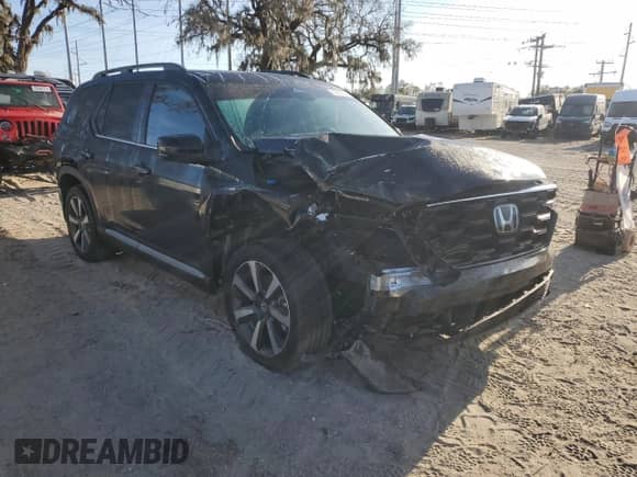 2023 Honda Pilot Touring с VIN 5FNYG2H77PB006594, выставлен на аукционе Copart как лот 83662854 с пробегом 37 637 миль миль и Списание • Salvage title. История ставок и продаж доступна на DreamBid. Изображение 4.