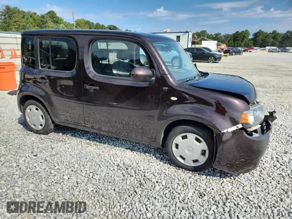 2013 Nissan Cube S z VIN JN8AZ2KR3DT304949, wystawiony jako Copart lot #71396525 z przebiegiem 107 779 mil mil oraz Szkoda całkowita • Salvage title. Historia ofert i sprzedaży dostępna na DreamBid. Obrazek 4.
