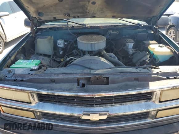 1995 Chevrolet Tahoe z VIN 1GNEK13K3SJ380698, wystawiony jako Copart lot #65834225 z przebiegiem 190 554 mil mil oraz Szkoda całkowita • Salvage title. Historia ofert i sprzedaży dostępna na DreamBid. Obrazek 12.