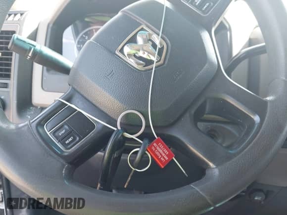 2012 Ram 1500 Express z VIN 1C6RD6KT4CS157701, wystawiony jako IAAI lot #43211967 z przebiegiem 189 672 mil mil oraz . Historia ofert i sprzedaży dostępna na DreamBid. Obrazek 11.