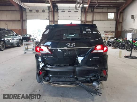 2018 Hyundai Santa Fe SE Ultimate z VIN KM8SRDHF9JU279730, wystawiony jako IAAI lot #42806129 z przebiegiem 59 397 mil mil oraz . Historia ofert i sprzedaży dostępna na DreamBid. Obrazek 6.