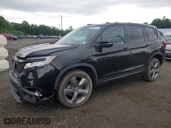 2021 Honda Passport Touring with VIN 5FNYF8H91MB036614, listed as a Copart auction lot 60569235 with 27,565 mi miles and Salvage title. Bid and sale history available at DreamBid. Image 1.