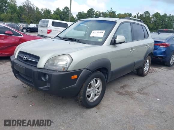 2006 Hyundai Tucson GLS with VIN KM8JN72D86U257564, listed as a IAAI auction lot 43199464 with 99,221 mi miles and . Bid and sale history available at DreamBid. Image 2.