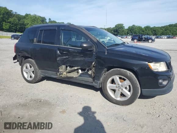 2012 Jeep Compass Limited с VIN 1C4NJCCB6CD592289, выставлен на аукционе Copart как лот 61002545 с пробегом 199 727 миль миль и Списание • Salvage title. История ставок и продаж доступна на DreamBid. Изображение 4.