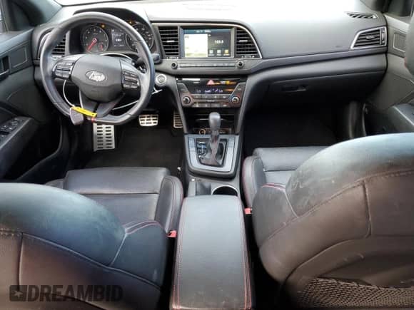 2018 Hyundai Elantra Sport с VIN KMHD04LB3JU451628, выставлен на аукционе Copart как лот 82335675 с пробегом 94 662 миль миль и Списание • Salvage title. История ставок и продаж доступна на DreamBid. Изображение 8.
