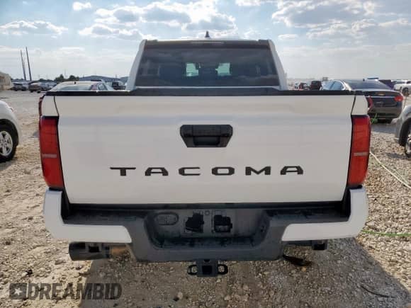 2024 Toyota Tacoma SR5 with VIN 3TMKB5FN9RM012984, listed as a Copart auction lot 81443195 with 16,677 mi miles and Clean title. Bid and sale history available at DreamBid. Image 6.