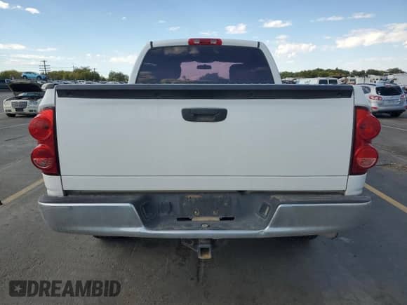 2007 Dodge 1500 с VIN 1D7HU18NX7S147041, выставлен на аукционе Copart как лот 85860855 с пробегом 133 540 миль миль и Списание • Salvage title. История ставок и продаж доступна на DreamBid. Изображение 6.