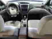 2011 Subaru Forester X with VIN JF2SHABC3BH776062, listed as a Copart auction lot 87313785 with 174,593 mi miles and Salvage title. Bid and sale history available at DreamBid. Image 8.