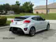 2014 Hyundai Veloster Turbo R-Spec с VIN KMHTC6AE1EU182840, выставлен на аукционе Copart как лот 80849145 с пробегом 56 852 миль миль и Чистый • Clean title. История ставок и продаж доступна на DreamBid. Изображение 4.