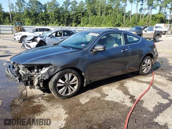 2008 Honda Accord LX-S with VIN 1HGCS123X8A020591, listed as a Copart auction lot 69256385 with 266,602 mi miles and Salvage title. Bid and sale history available at DreamBid. Image 1.