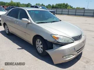 2004 Toyota Camry LE with VIN 4T1BF32K14U067398, listed as a IAAI auction lot 42844032 with 199,936 mi miles and . Bid and sale history available at DreamBid. Image 1.