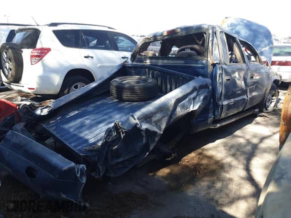 2003 Dodge Dakota Sport с VIN 1D7HL38N73S132148, выставлен на аукционе Copart как лот 53938265 с пробегом Не указан миль и На запчасти • Non repairable. История ставок и продаж доступна на DreamBid. Изображение 3.