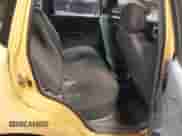 2005 Chevrolet Aveo LS z VIN KL1TD62655B310654, wystawiony jako IAAI lot #41389685 z przebiegiem 107 879 mil mil oraz . Historia ofert i sprzedaży dostępna na DreamBid. Obrazek 8.