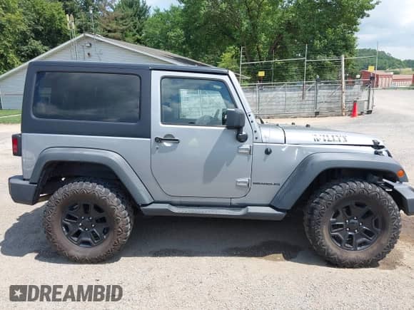 2015 Jeep Wrangler Sport with VIN 1C4AJWAG2FL507778, listed as a IAAI auction lot 42665428 with 126,554 mi miles and . Bid and sale history available at DreamBid. Image 14.