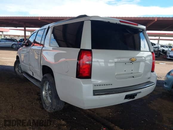 2018 Chevrolet Suburban Premier z VIN 1GNSKJKC2JR183843, wystawiony jako IAAI lot #42391298 z przebiegiem 159 283 mil mil oraz . Historia ofert i sprzedaży dostępna na DreamBid. Obrazek 3.