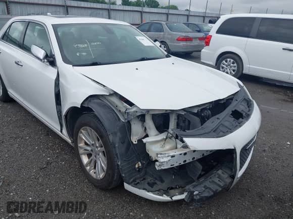 2016 Chrysler 300 C with VIN 2C3CCAEGXGH334188, listed as a IAAI auction lot 42166397 with 283,680 mi miles and . Bid and sale history available at DreamBid. Image 6.