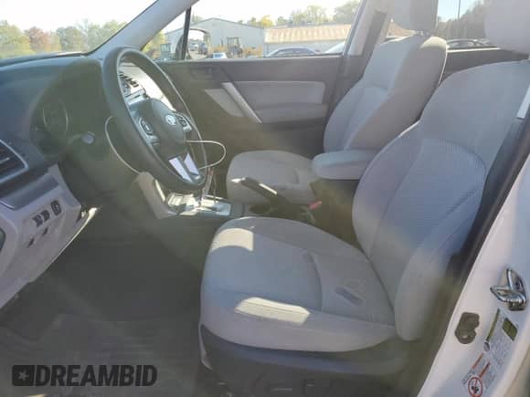 2018 Subaru Forester Premium z VIN JF2SJAEC2JH571704, wystawiony jako Copart lot #87062545 z przebiegiem 103 181 mil mil oraz Szkoda całkowita • Salvage title. Historia ofert i sprzedaży dostępna na DreamBid. Obrazek 7.