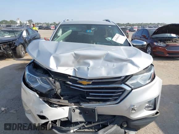 2018 Chevrolet Equinox Premier with VIN 3GNAXMEV8JL113945, listed as a IAAI auction lot 43089634 with 95,291 mi miles and . Bid and sale history available at DreamBid. Image 12.
